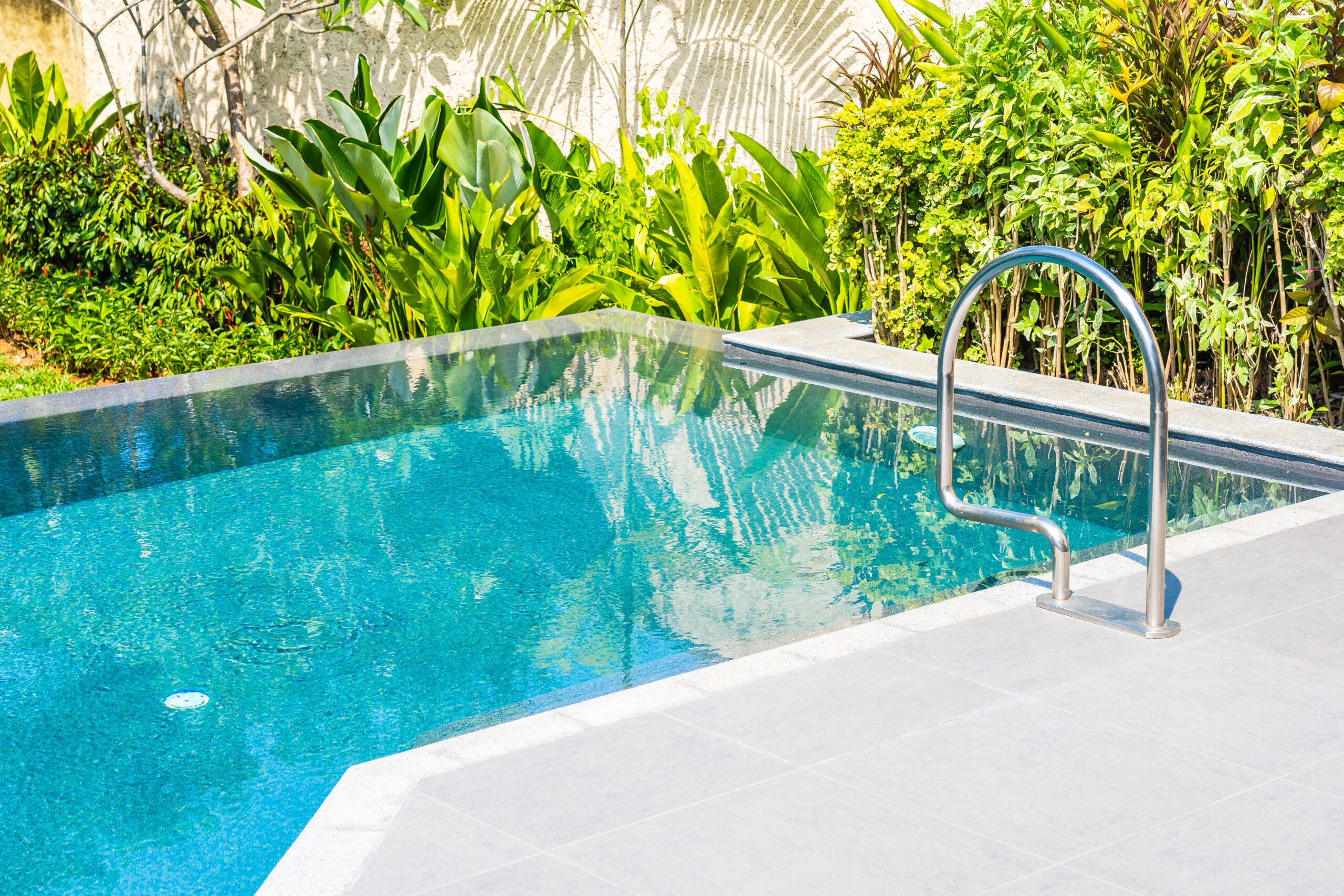 Beautiful landscape outdoor swimming pool at hotel resort leisure
